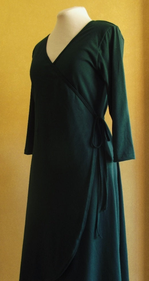 side view of Australian made cotton wrap dress in bottle green with 3/4 sleeves