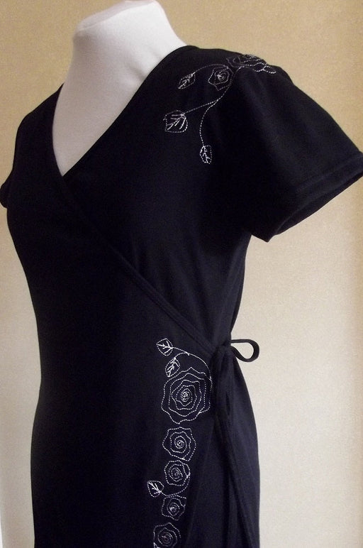 black womens embroidered cotton wrap dress with short sleeves and white embroidery