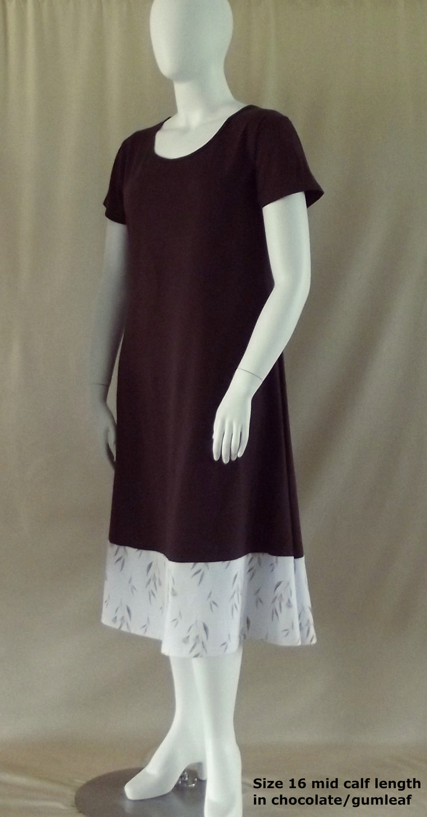 Plus size brown short sleeve cotton dress with gumleaf hem detail