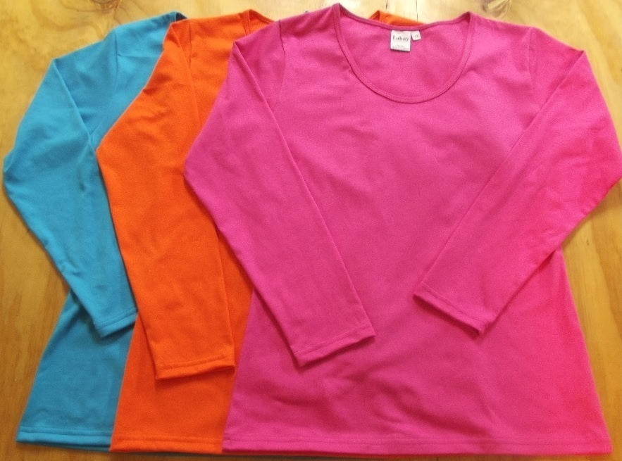 a flat  lay of long sleeve cotton t-shirts in hot pink, turquoise and jaffa