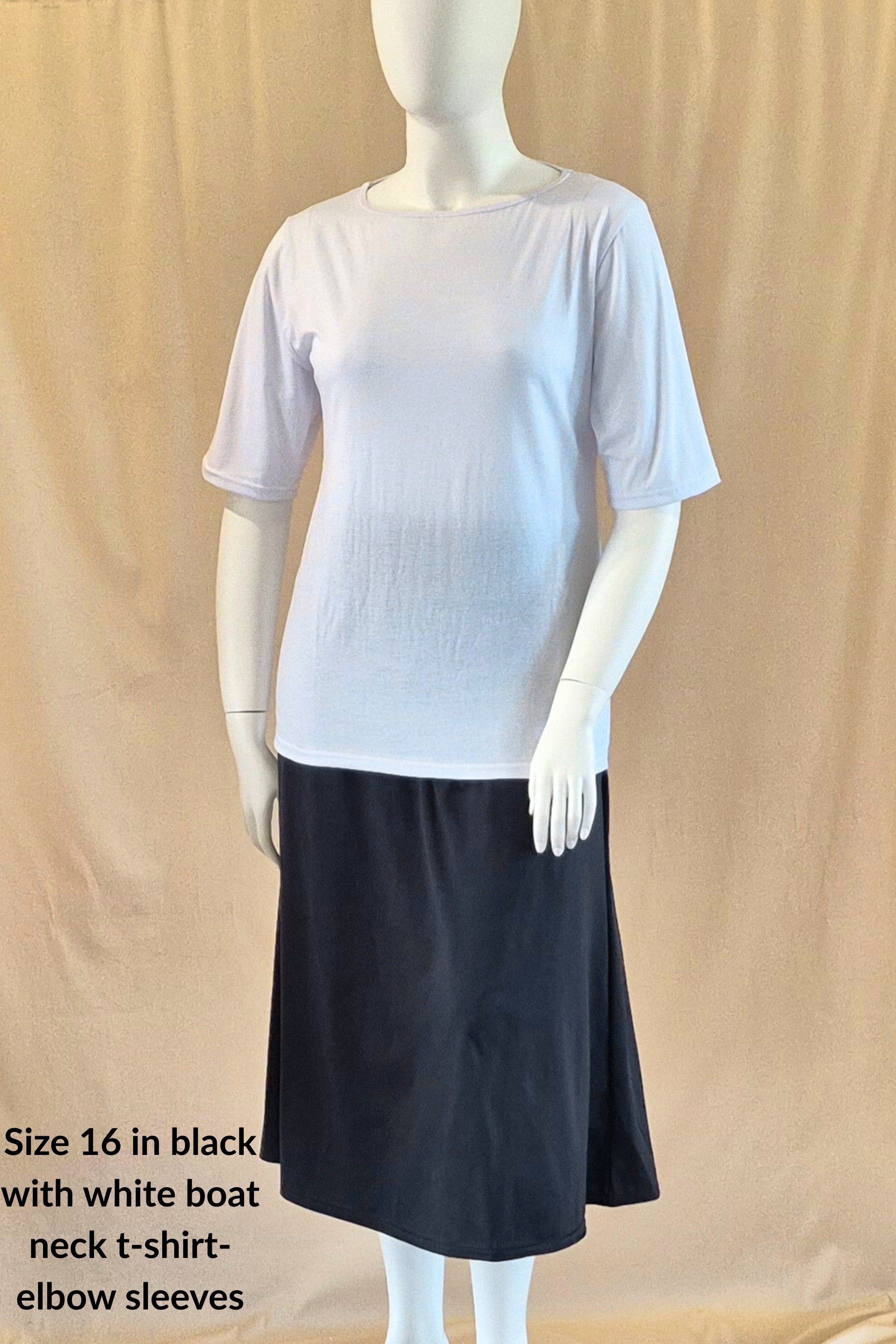 Plus size cotton white boat neck t-shirt with elbow sleeves and a black A-line cotton skirt 