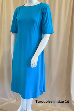 turquoise plus size cotton boat neck dress in mid calf length with elbow length sleeves