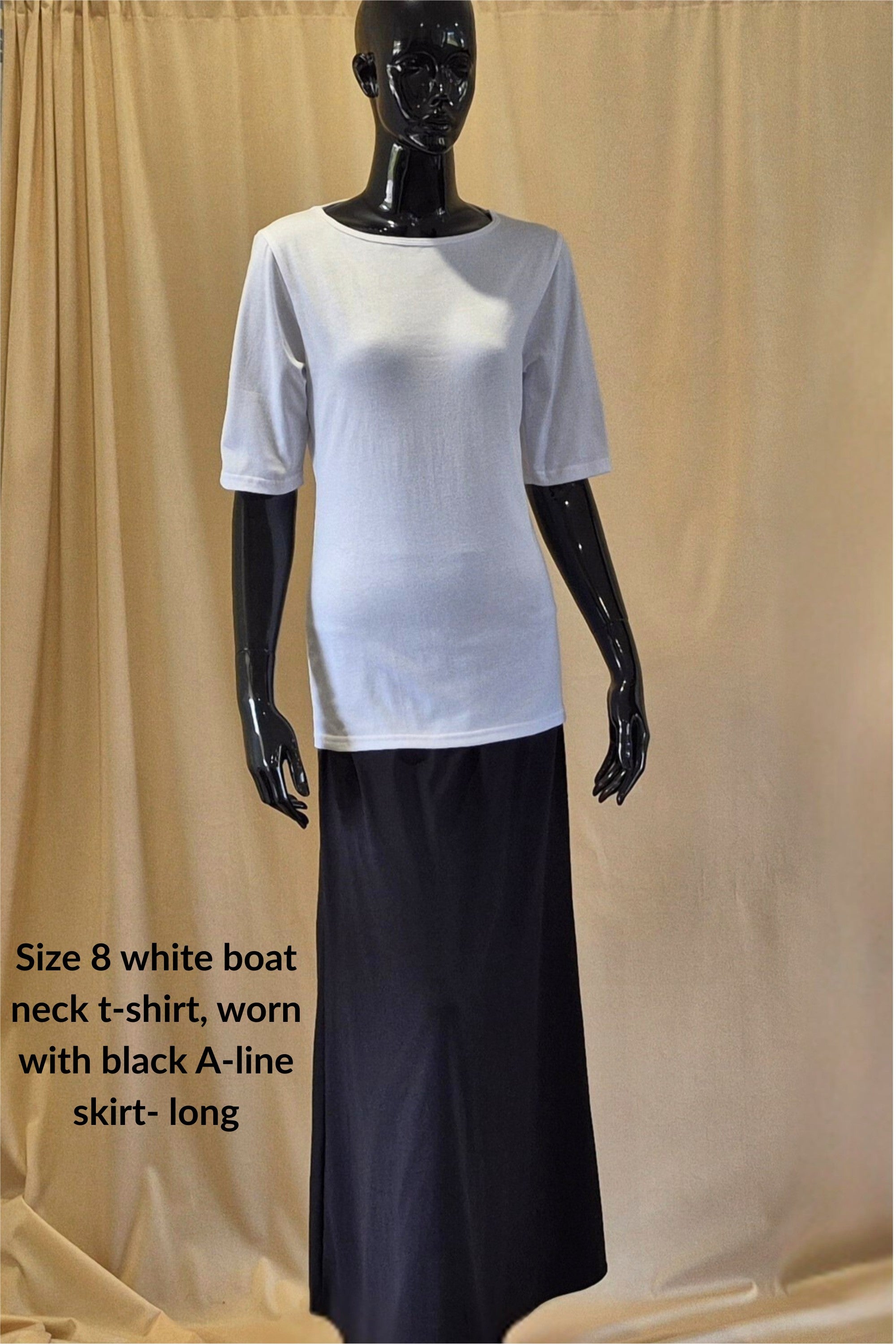 cotton white boat neck t-shirt and black A-line skirt 