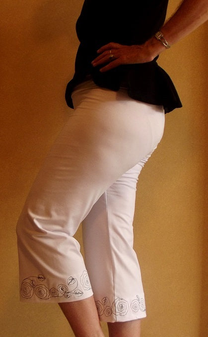 3/4 length white yoga pants with black embroidery